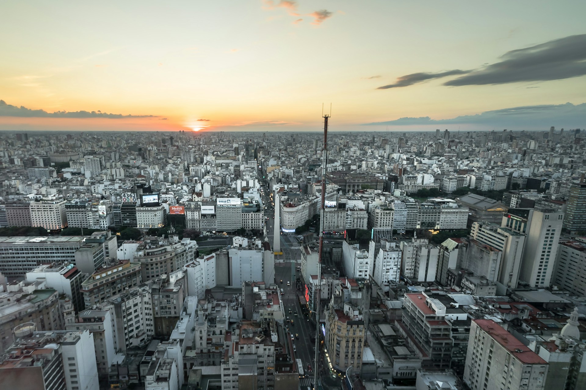 Aerial view of the Buenos Aires skyline at sunset with high-rise buildings